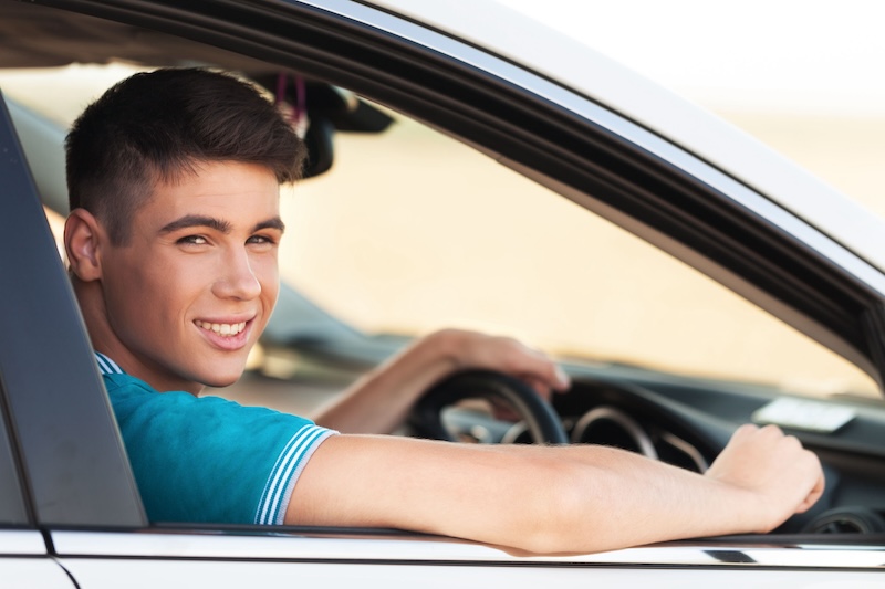 Portrait of Young Man in his Car